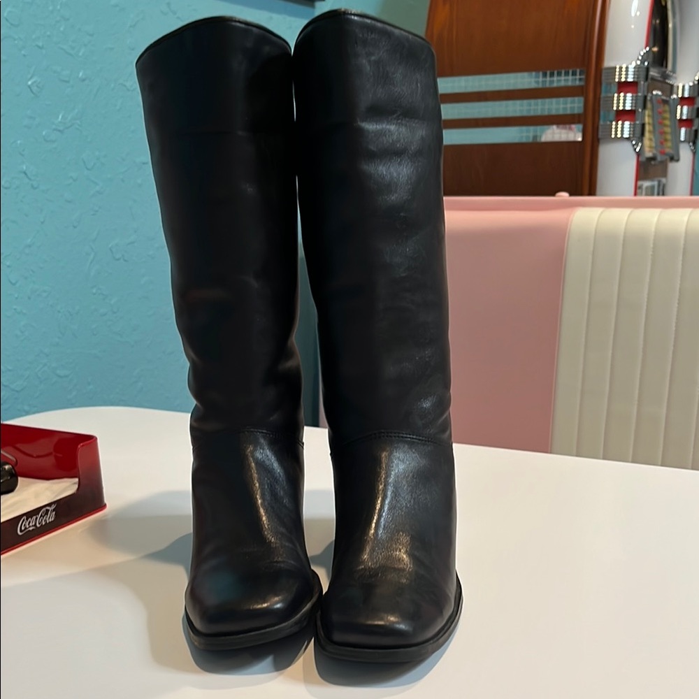 Sleek Black Leather Heeled Boots